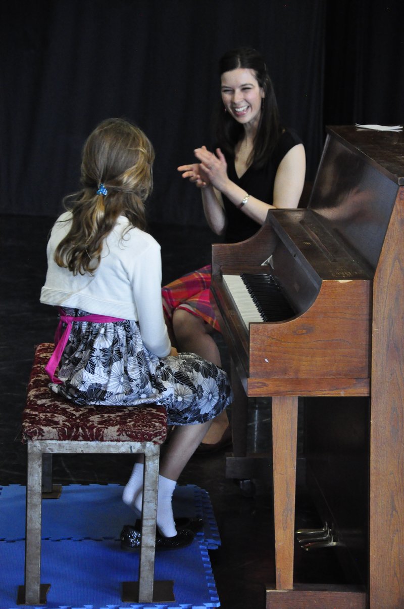 Child learning piano with Natasha Finlay